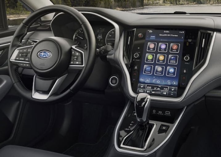The interior center console of a 2021 Subaru Outback, showing a large touchscreen that spans the entire area.