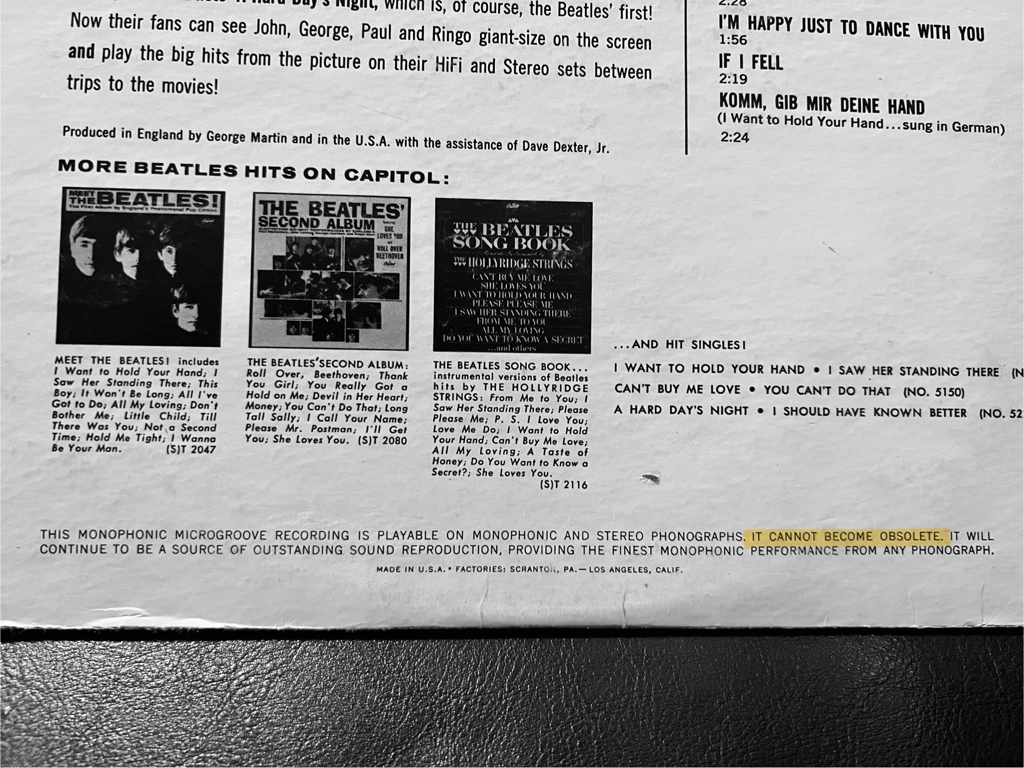 The back cover of the Meet The Beatles album on vinyl.