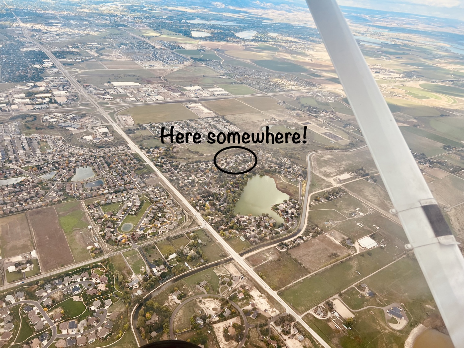 Aerial view of Fort Collins, CO, with a black circle around my neighborhood.